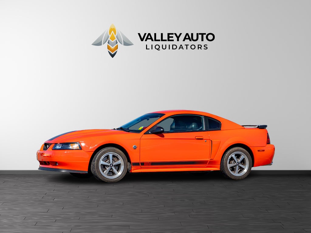 2004 Ford Mustang Mach 1 in Orange — front three-quarter view
