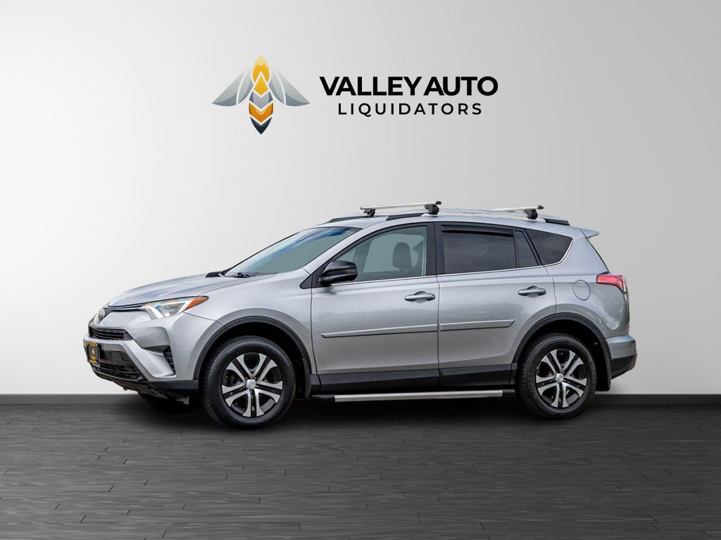 2018 Toyota RAV4 LE in Silver — front three-quarter view