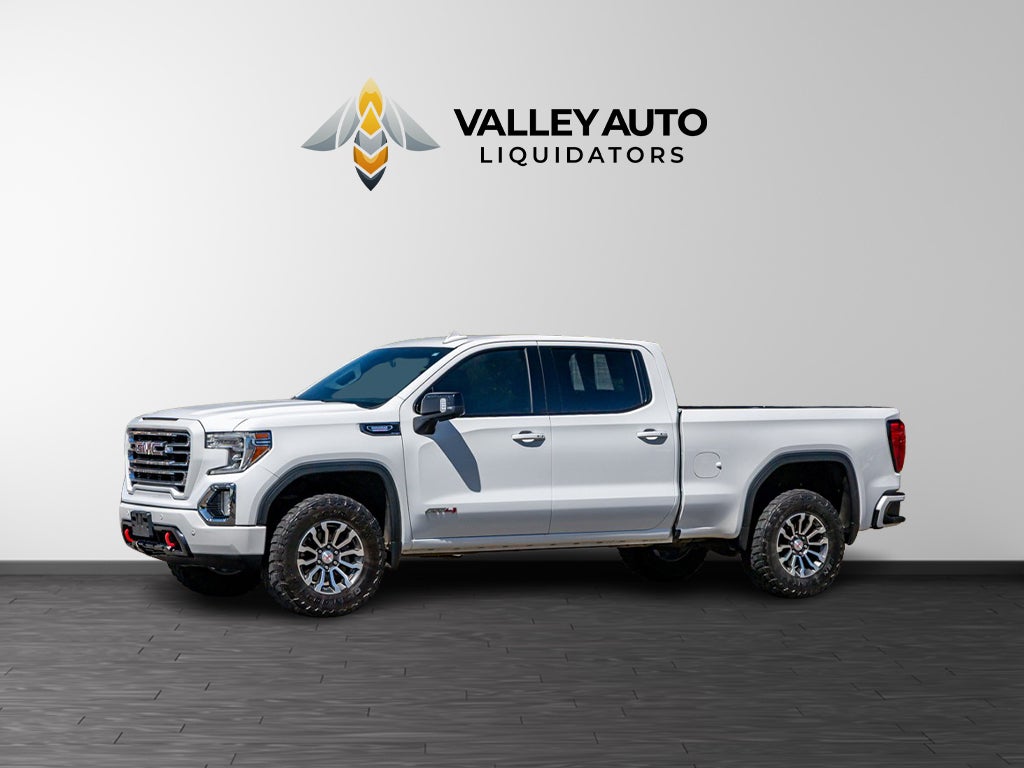 2021 GMC Sierra AT4 in White — front three-quarter view