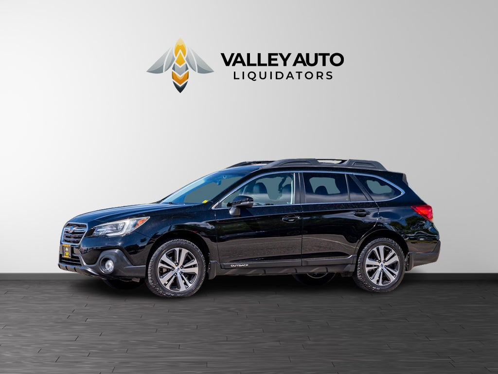 2018 Subaru Outback Limited in Black — front three-quarter view
