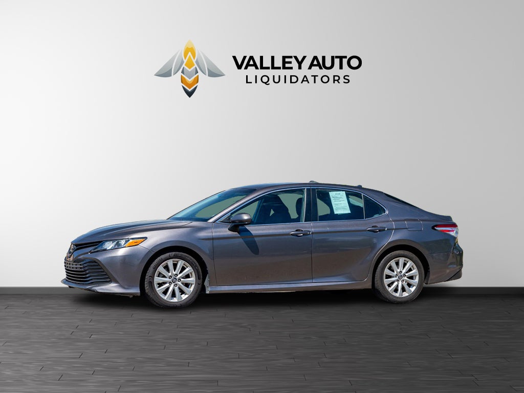 2019 Toyota Camry Base in Grey — front three-quarter view