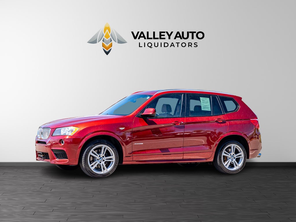2014 BMW X3 xDrive28i in Red — front three-quarter view