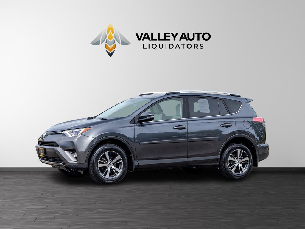 2016 Toyota RAV4 XLE in Gray — front three-quarter view