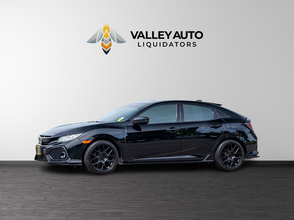 2018 Honda Civic Sport in Black — front three-quarter view